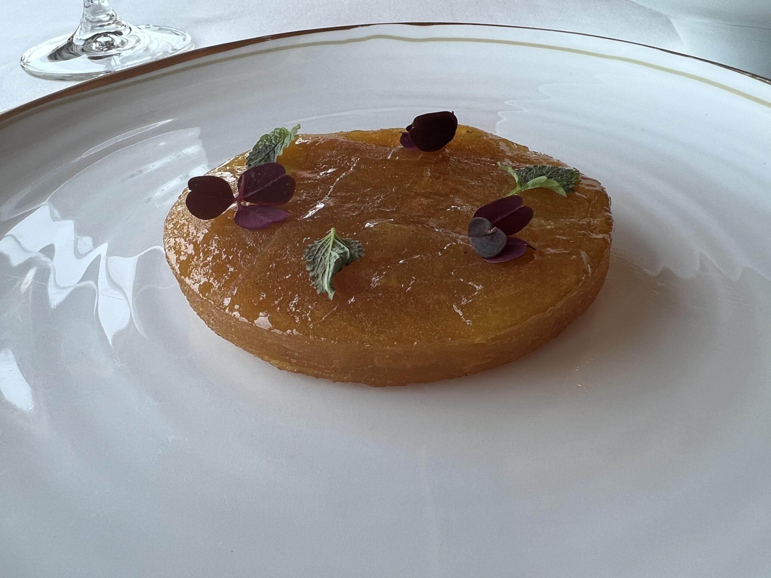 apple tart with a shortbread crust and a side of
vanilla ice cream.